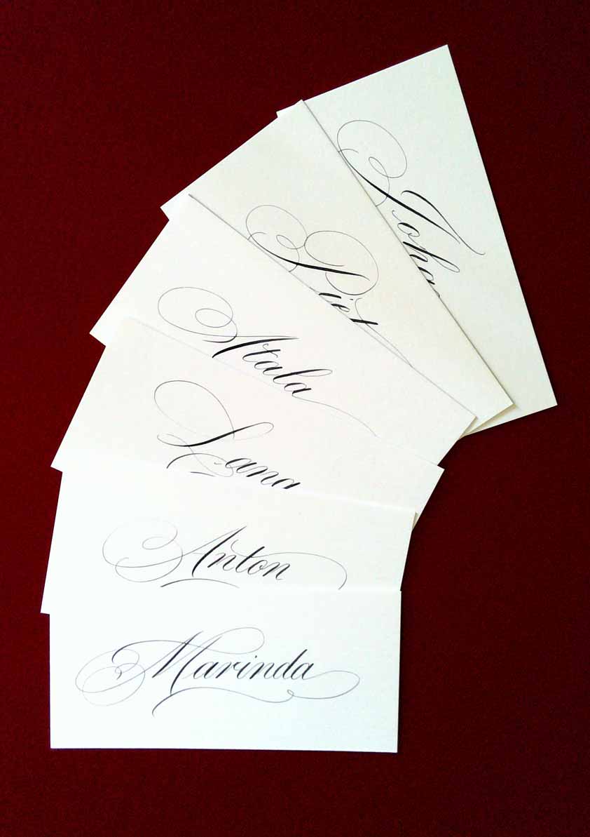 Spread of placecards with Calligraphy from Edward Curran